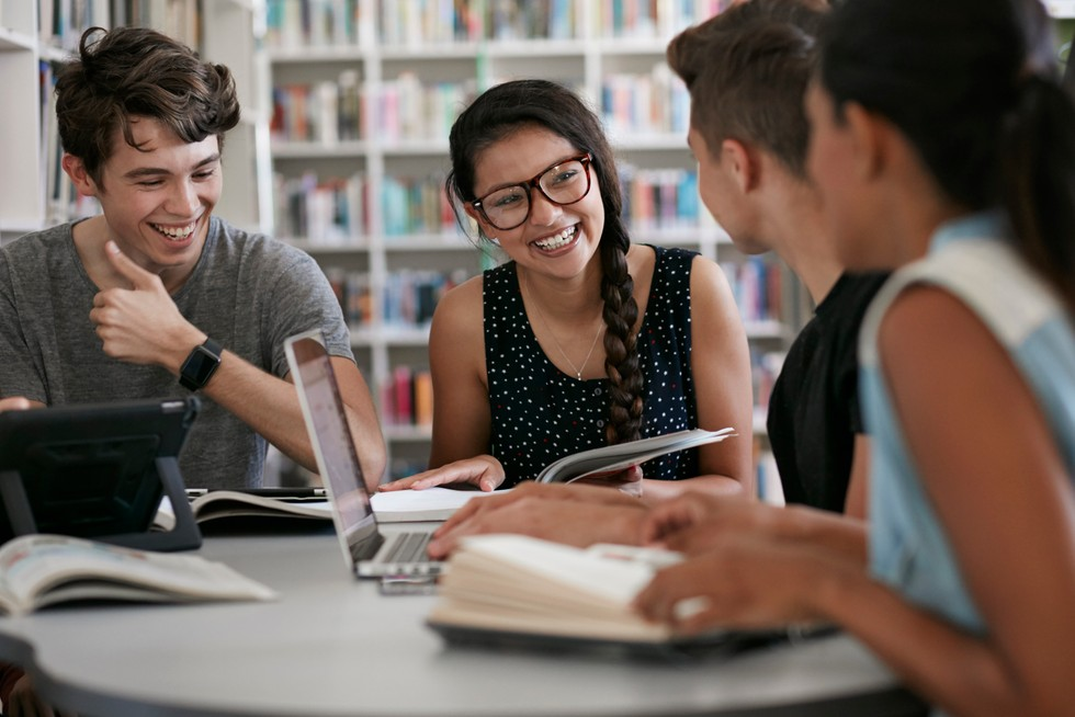 A group of students studying and collaborating together